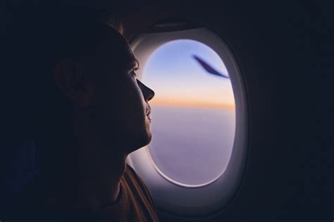 Man Traveling By Airplane Stock Photo Download Image Now Istock