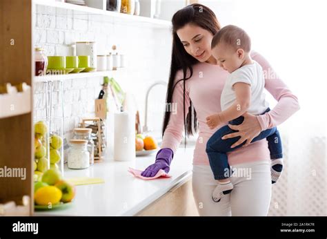 Boy Helping Mother With Chores Hi Res Stock Photography And Images Alamy