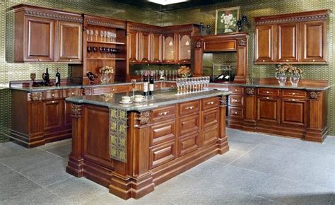 Many people put their top cabinets as high as their roof will allow, but then cannot access the top shelves of the cabinets without using a chair. Buying High Quality Kitchen Cabinets Tips | How To Build A ...