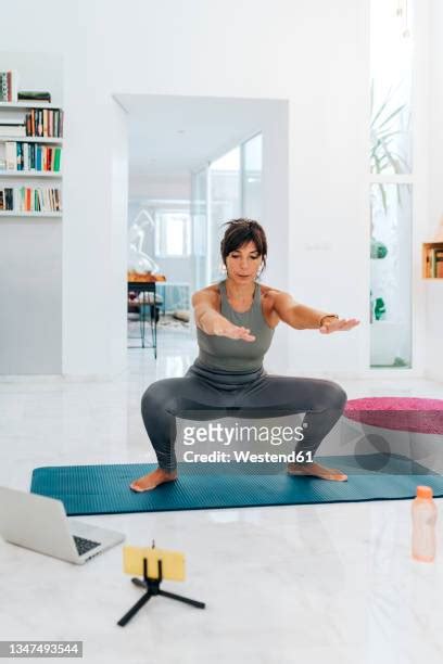 mature woman squat exercise photos and premium high res pictures getty images