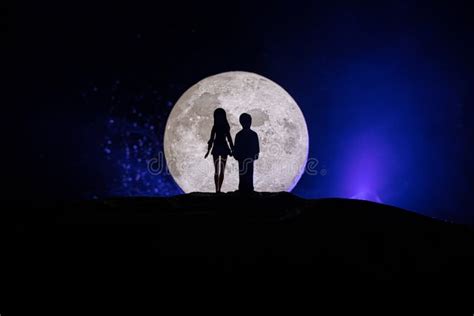 Young Couple In Love At Beautiful Moon Of Night Stock Photo Image Of
