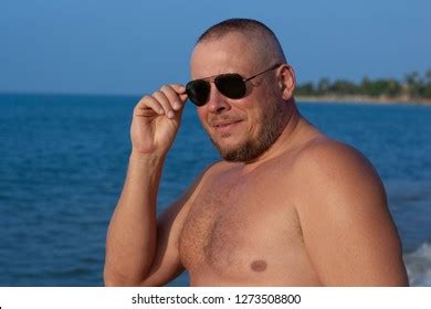 Tanned Man Nude Torso Sunglasses Posing Stock Photo