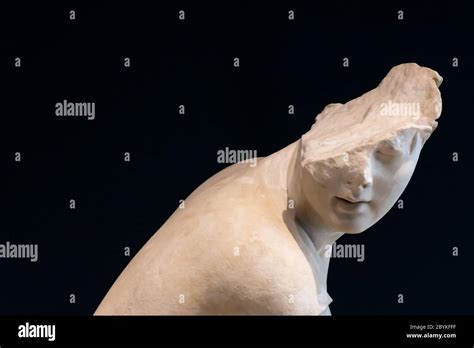 Ancient Roman Statue Of Young Person With A Broken Face Stock Photo Alamy