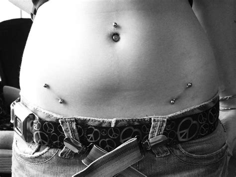 surface hips piercing piercing tattoo tattoos and piercings i tattoo cute piercings dream