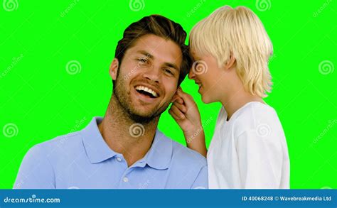 Son Pinching The Ear Of His Father On Green Screen Stock Footage
