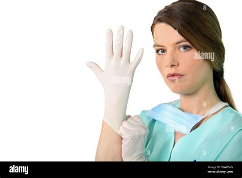Nurse Putting On Latex Gloves Stock Photo Alamy