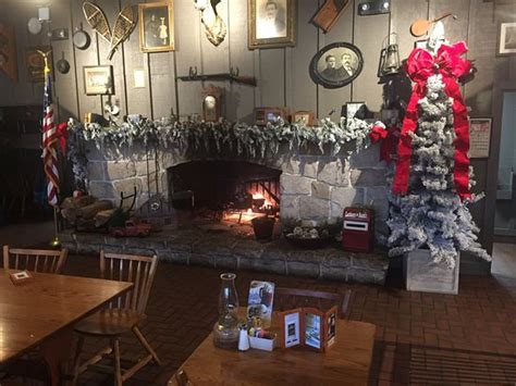 There is lot's of beautiful decorations, farmhouse truck and ornaments. Fireplace Christmas decorations - Picture of Cracker ...