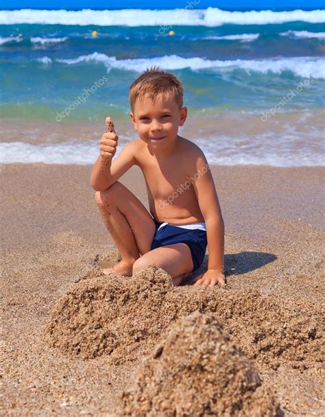 Boy Playing On The Beach Stock Photo By Beerkoff