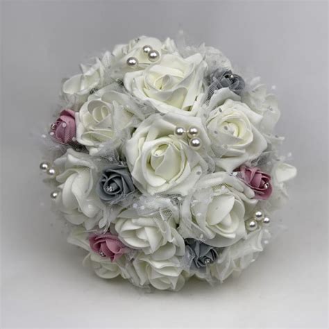 Customise your wedding flowers to suit your wedding colours perfectly. Artificial Wedding Flowers Package Netted Roses (3 colours)