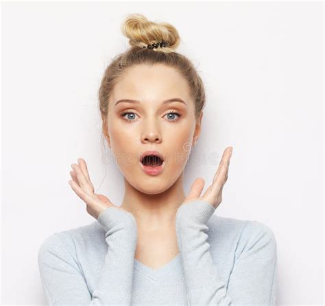 Indoor Shot Of Stupefied Shocked Blonde Woman Keeps Mouth Widely Opened