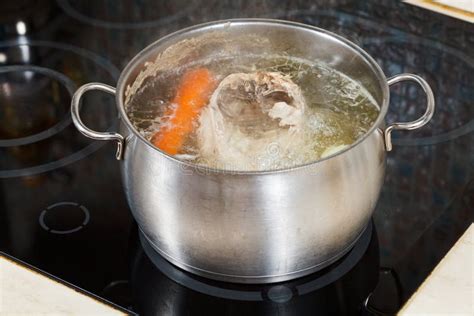 simmering chicken soup with seasoning vegetables stock image image of cook cooking 35396453