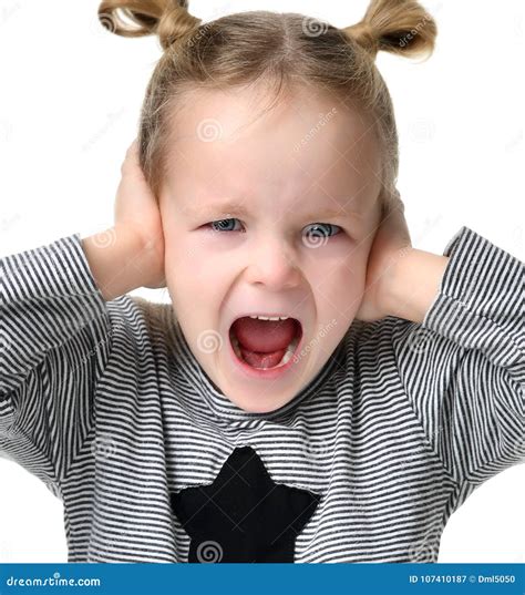 Child Baby Girl Happy Yelling Screaming With Hands Closing Ears Stock