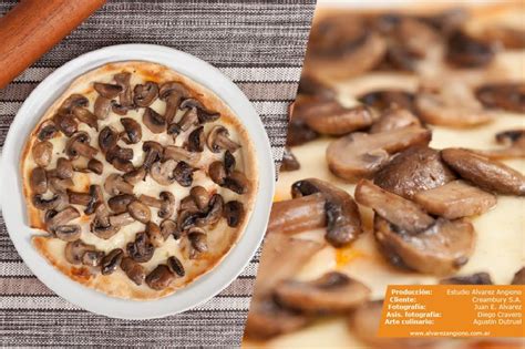 A Pizza With Mushrooms And Cheese On It