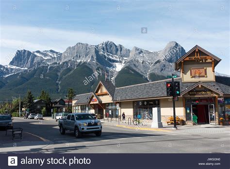 Beautiful Canmore Town With Pine Forest And The Rocky Mountains In The