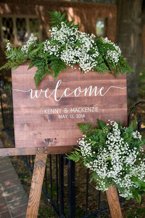 Wooden Welcome Wedding Sign With Babys Breath And Greenery