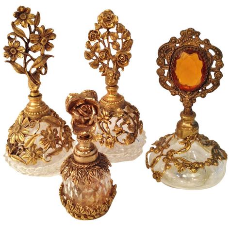 Collection Of Four French Antique Perfume Bottles In Gilded Brass And Cut Crystal At 1stdibs