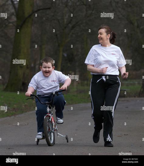 Mother And Obese Child On A Healthy Lifestyles Programme Goals Go For