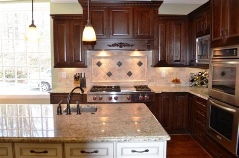 Black kitchen cabinets white countertops and stainless steel. Image result for ornamental granite cherry cabinet (With images) | Kitchen design, Kitchen