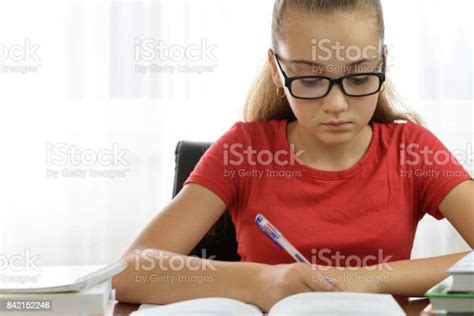 Portrait Of A Student Doing Homework Stock Photo Download Image Now