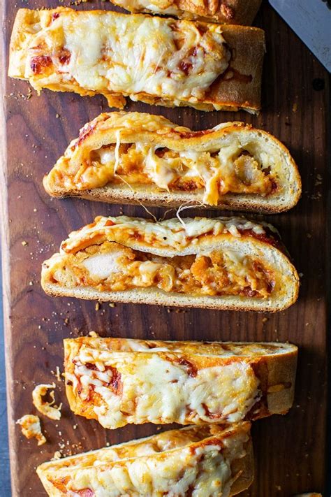 Fold the dough over and pinch to seal the edges of the calzone. Chicken Parmesan Calzone Recipe | Recipe | Calzone recipe ...