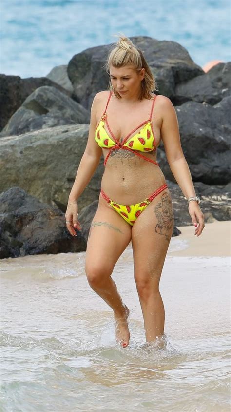 olivia buckland displays her tattooed body in barbados 29 photos video thefappening