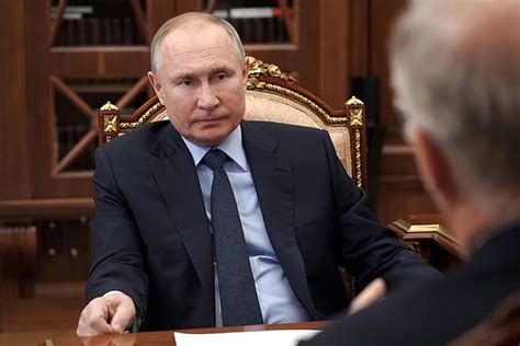 putin signs law allowing him to hold power until 2036