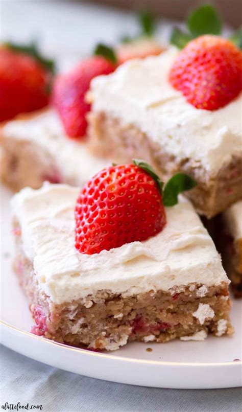 Make your desserts more exciting with flavored whipped cream. Strawberry Blondies with Whipped Cream Frosting - A Latte Food