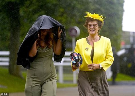 Come Rein Or Shine Glamorous Goodwood Revellers Brave The Wet Weather