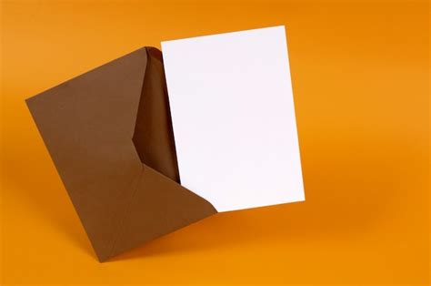 Free Photo Open Brown Envelope With Letter