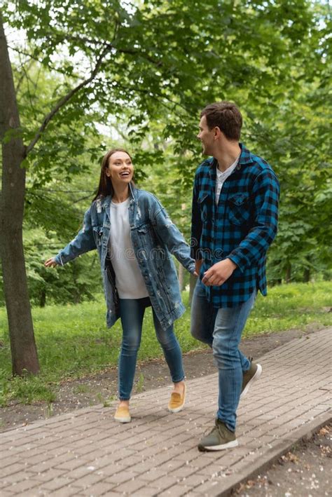 Couple Holding Hands And Looking At Stock Image Image Of Happiness