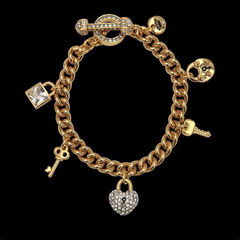 Discover the latest juicy couture collection of designer tracksuits, sportswear, loungewear and luxe clothing. Juicy Couture Key Lock Charms Bracelet in Gold | Lyst