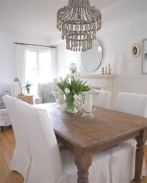 The dining room is a.r. I'm not sure why my hubby thinks empty tables are ...