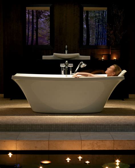 Acrylic is a non porous, solid surface that is easy to clean and the space saving design of a kohler corner tub provides a spa like experience, more freedom of movement both in and out of the tub, and serves as. bold Ideas from Kohler | Kohler tub, Relax spa, Kohler