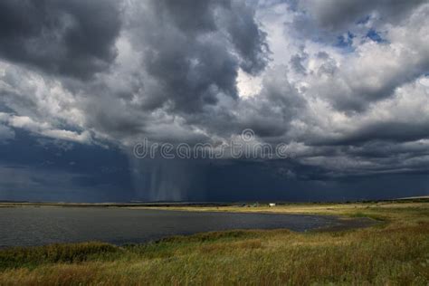 Rain From The Clouds Over A Lake Stock Image Image Of Road Showery