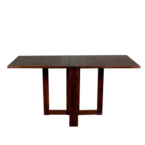 Each half of the table can fold down to fit small spaces or for use as a serving table for instance. Incredible Solid Wood 4-Square Pedestal Folding Dining Room Table