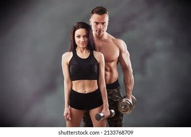Sporty Couple Showing Muscles Muscular Man Stock Photo Edit Now