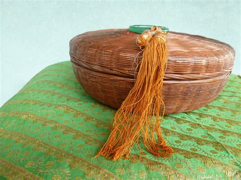 vintage chinese sewing basket with peking glass bangle silk tassel