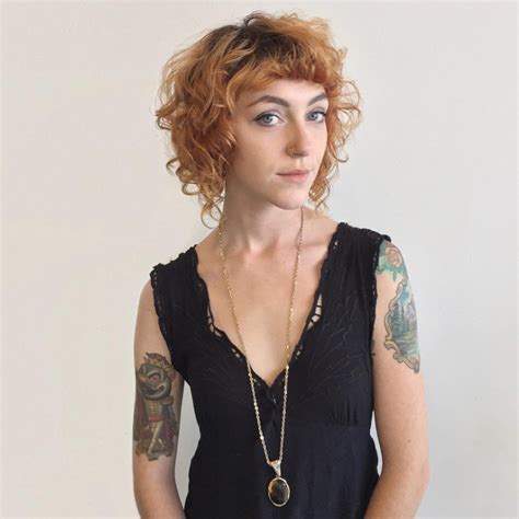 Looking for more curly hair fringe inspiration? Curly Angled Bob with Fringe Bangs and Soft Copper Color - The Latest Hairstyles for Men and ...