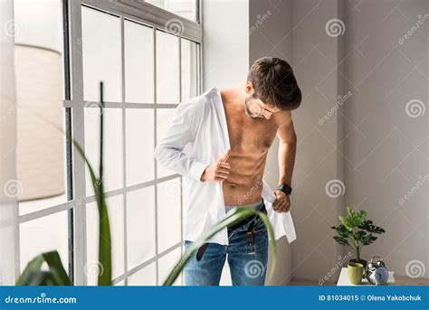 Male Worker Changing Clothing At Home Stock Image Image Of Casual