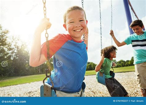 Hanging Out With My Best Buddies Portrait Of A Young Boy Playing On A