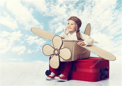 Child Playing Airplane Pilot Kid Traveler Flying In Helmet On Suitcase