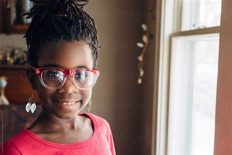 Cute Black Girl Wearing Glasses By Stocksy Contributor Gabriel Gabi