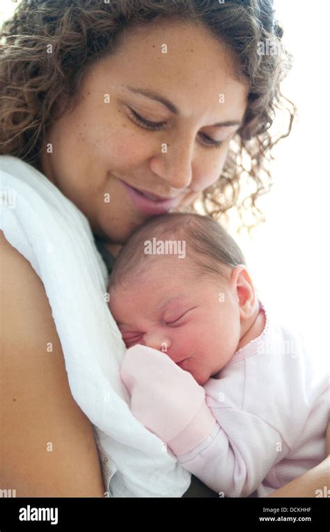 Young Mother Holding New Born Baby Stock Photo Alamy