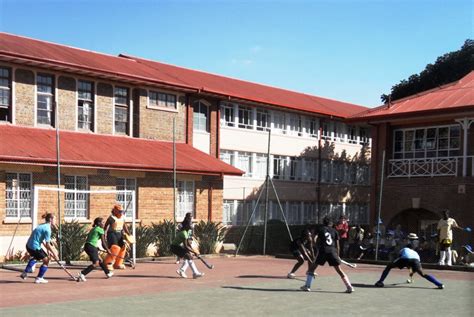 School Kids Playing A Competitive Game Of Hockey In Harare Zimbabwe