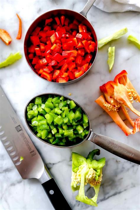 In a large mixing bowl, add the cooked, cooled and drained pasta, along with about 1/3 of the pesto sauce (as a start). Pesto Pasta Salad | foodiecrush.com