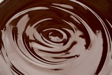 Macro Of Melted Dark Or Milk Chocolate Bar In Swirl Stock Photo Image
