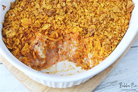 Step 5 bake in the preheated oven until casserole is bubbling and cheese is melted, about 30 minutes. Cheesy Dorito Chicken Casserole Recipe - BubbaPie