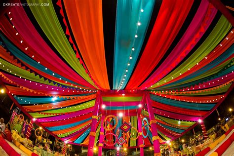 indian wedding backdrop ideas colorful mela themed colorful woollen thread hanging for the