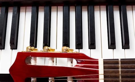 Premium Photo | Music background. guitar and piano.