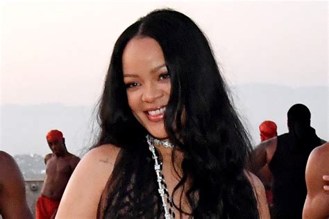 Rihanna Is Bolder Than Ever In A Lace Bodysuit Thigh High Stockings